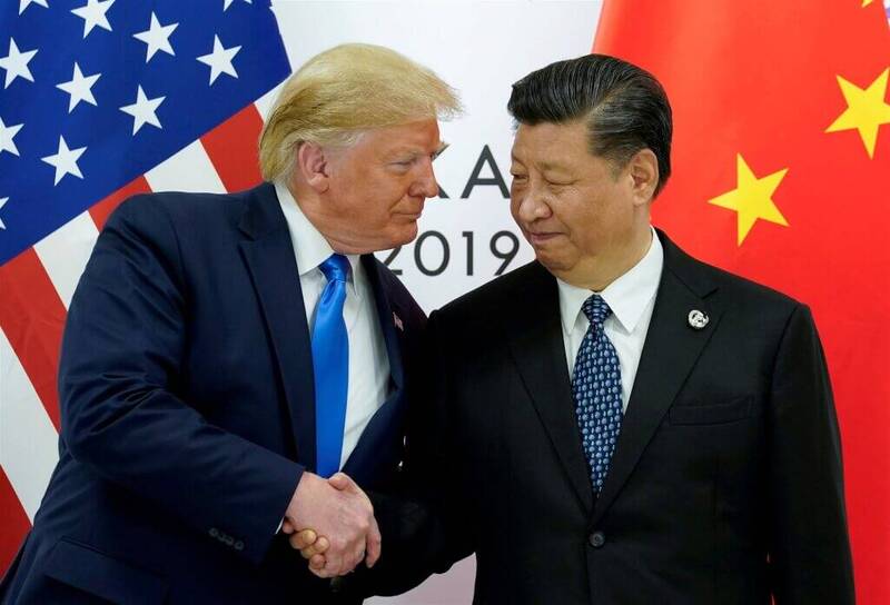 美国总统川普（左）与中国国家主席习近平（右）2019年6月在日本大阪举行的G20峰会会面。（路透）