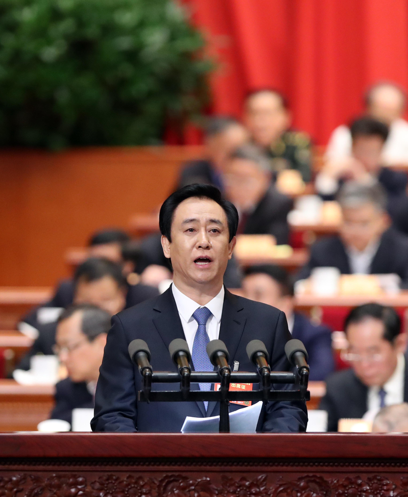 中国恒大案牵连众多中共官员。图为时任中国全国政协委员的许家印，2017年3月9日...