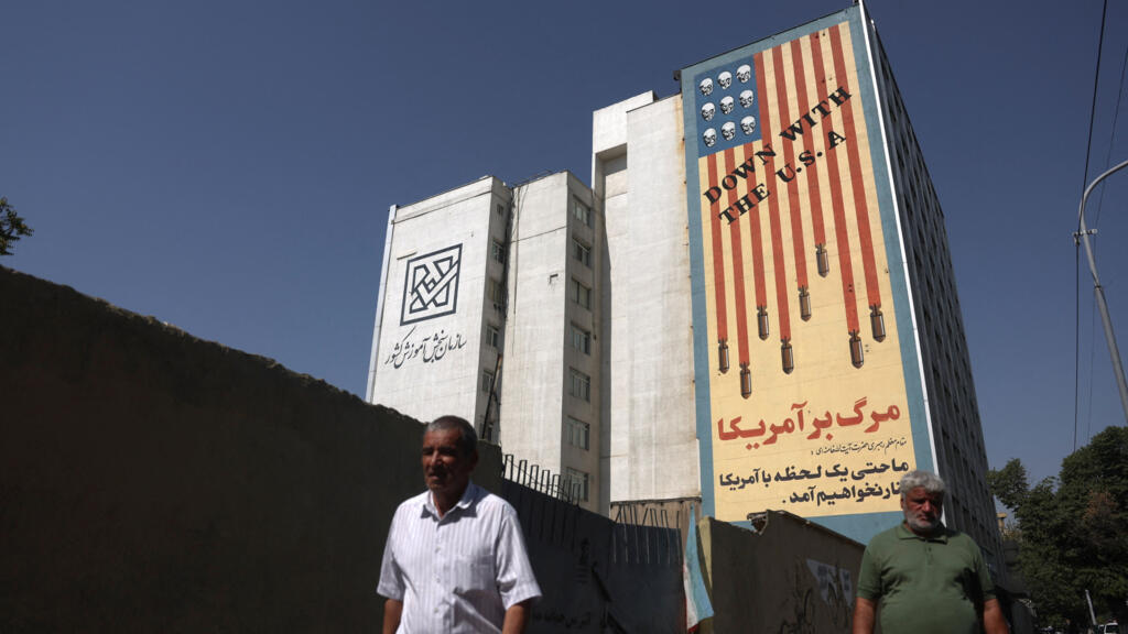 People walk near an anti-U.S. mural in Tehran, Iran, July 13. 2026. People walk near an anti-U.S. mural in Tehran, Iran, July 13. 2026.